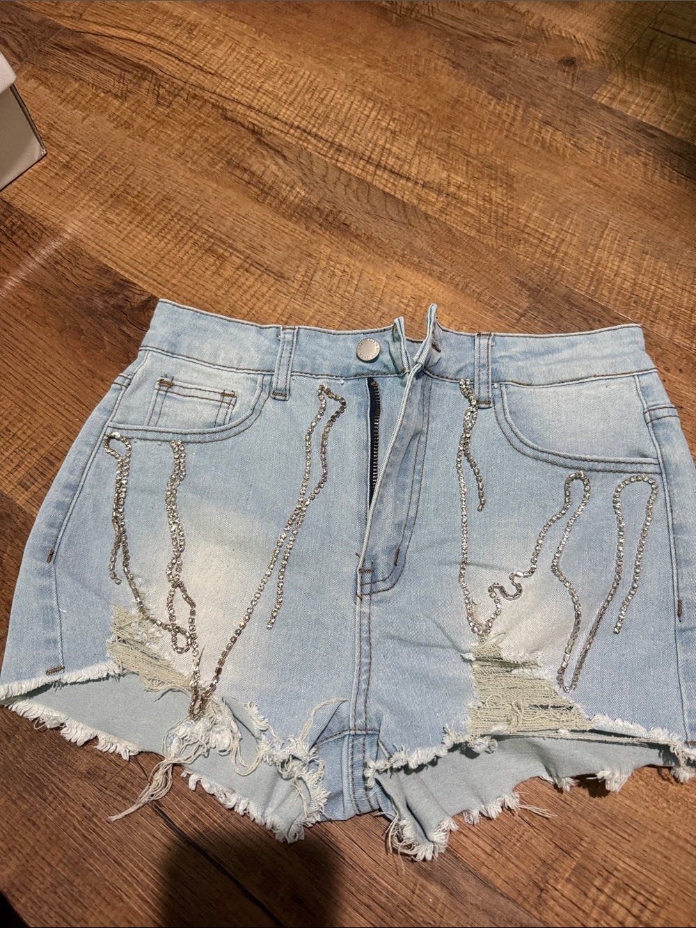 Light Blue Denim Distressed Women's Shorts with Rhinestone Accents